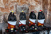 The great Chola temples of Tamil Nadu - The Brihadishwara Temple of Thanjavur. Sculptures of deities inside eastern wall of the cloister. 